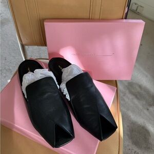 INTENTIONALLY BLANK Black Leather Flats